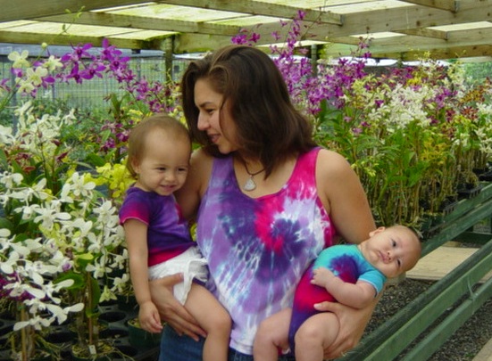 Nicole, Makenna, and Oren with <a href="http://orchidshi.com" target="orchids">orchids</a> in HI.